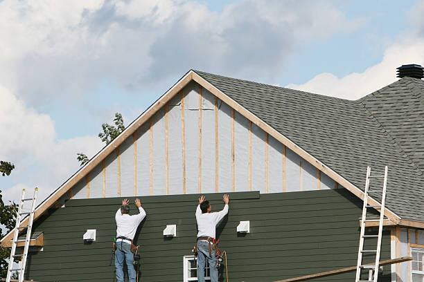 Professional Emergency Siding Repair technician working in Delta, OH